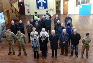 The group in the Drill Hall on Devonshire Road preparing to depart