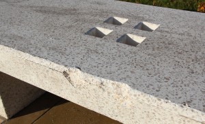 The damage caused to the plinth and benches, believed to have been caused by skateboards or scooters The damage caused to the plinth and benches, believed to have been caused by skateboards or scooters
