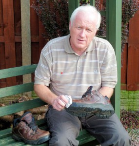 Steve Williams polishing his boots in preparation for the sponsored walk on Sunday 14th August